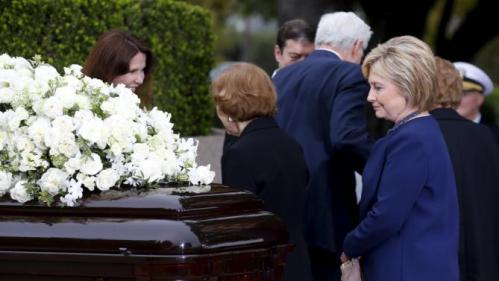 Former first lady Rosalynn Carter (C) greets Patti Davis as she and former first lady Hillary Clinton (R) pay their respects during the funeral for former first lady Nancy Reagan at the Ronald Reagan Presidential Library in Simi Valley, California March 11, 2016. REUTERS/Mike Blake