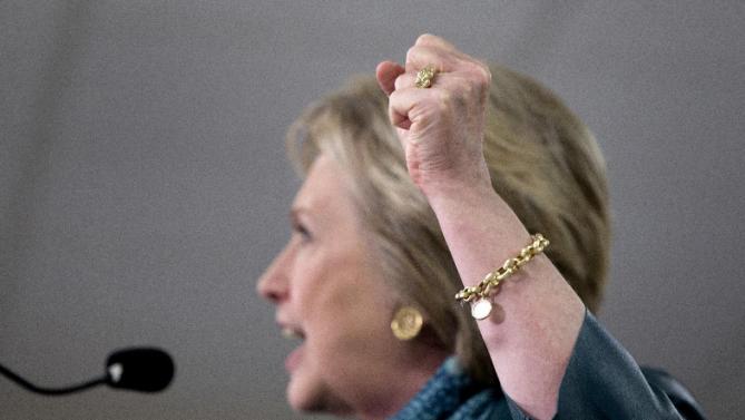 Democratic presidential candidate Hillary Clinton shakes her fist as she speaks during a campaign event at the IAM District 751 Everett Union Hall in Everett, Wash., Tuesday, March 22, 2016. (AP Photo/Carolyn Kaster)