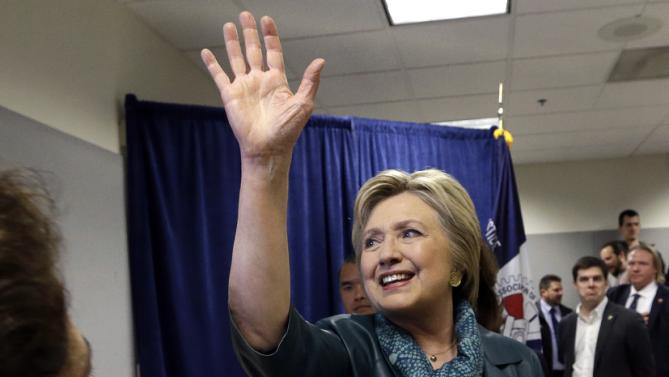 Democratic presidential candidate Hillary Clinton waves goodbye after greeting people following a campaign event at the Boeing Machinists' union hall Tuesday, March 22, 2016, in Everett, Wash. (AP Photo/Elaine Thompson)