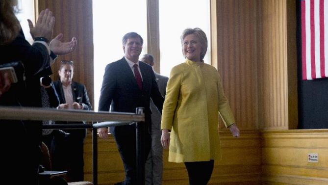Democratic presidential candidate Hillary Clinton arrives with former United States Ambassador to Russia Michael McFaul to speak about counterterrorism, Wednesday, March 23, 2016, at the Bechtel Conference Center at Stanford University in Stanford, Calif. (AP Photo/Carolyn Kaster)