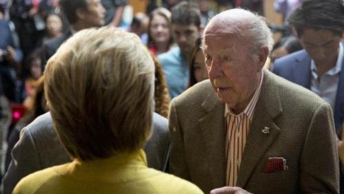 Democratic presidential candidate Hillary Clinton speak with President Ronald Reagan's former Secretary of State George Shultz after speaking about counterterrorism, Wednesday, March 23, 2016, at the Bechtel Conference Center at Stanford University in Stanford, Calif.  (AP Photo/Carolyn Kaster)