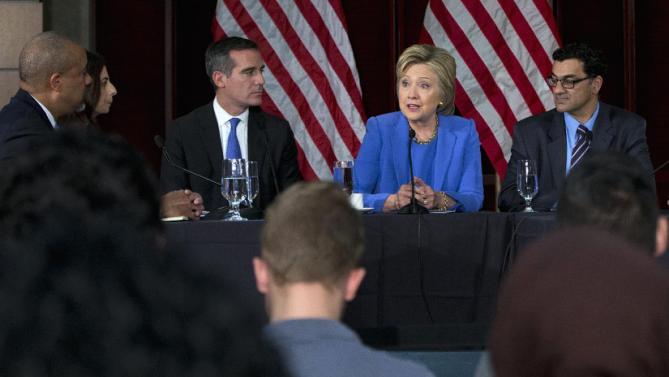 Democratic presidential candidate Hillary Clinton participates in a roundtable with Muslim community leaders at the University of Southern California in Los Angeles, Thursday, March 24, 2016. From left are, City of Los Angeles General Manager, Emergency Management Department James Featherstone, Senior Policy Analyst City of Los Angeles Human Relations Commission & Adjunct Assistant Professor (CSUDH) Joumana Silyan-Saba, Los Angeles Mayor Eric Garcetti, Clinton, and President of the Muslim Public Affairs Council, Salam Al-Marayati (AP Photo/Carolyn Kaster)