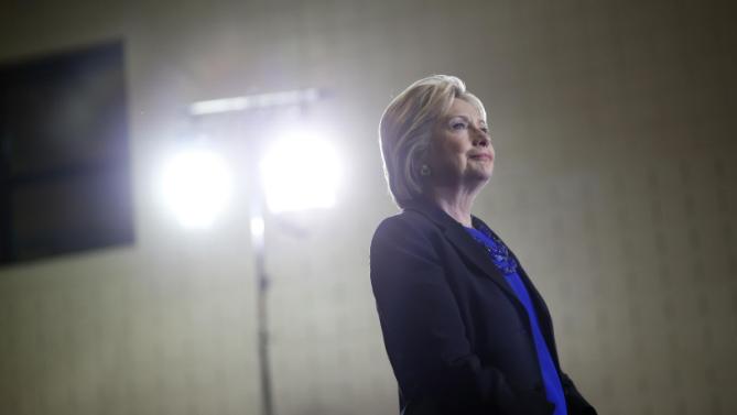 Democratic presidential candidate Hillary Clinton waits to be introduced before speaking at the Mary Ryan Boys and Girls Club in Milwaukee, Wis., Monday, March 28, 2016. (AP Photo/Patrick Semansky)