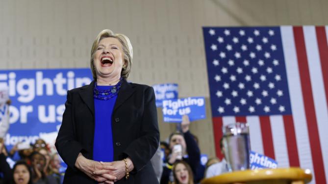 Democratic presidential candidate Hillary Clinton laughs as she is introduced during a rally at the Mary Ryan Boys and Girls Club in Milwaukee, Wis., Monday, March 28, 2016. (AP Photo/Patrick Semansky)