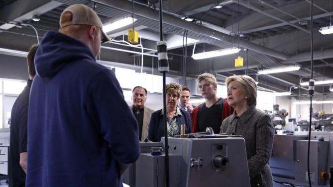 Democratic presidential candidate Hillary Clinton tours Western Technical College before holding a rally in La Crosse, Wis., Tuesday, March 29, 2016. (AP Photo/Patrick Semansky)