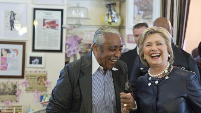 Democratic presidential candidate Hillary Clinton, right, meets Rep, Charles Rangel, background, D-N.Y. during a campaign stop at the Make My Cake bakery, Wednesday, March 30, 2016, in the Harlem neighborhood of New York. (AP Photo/Mary Altaffer)