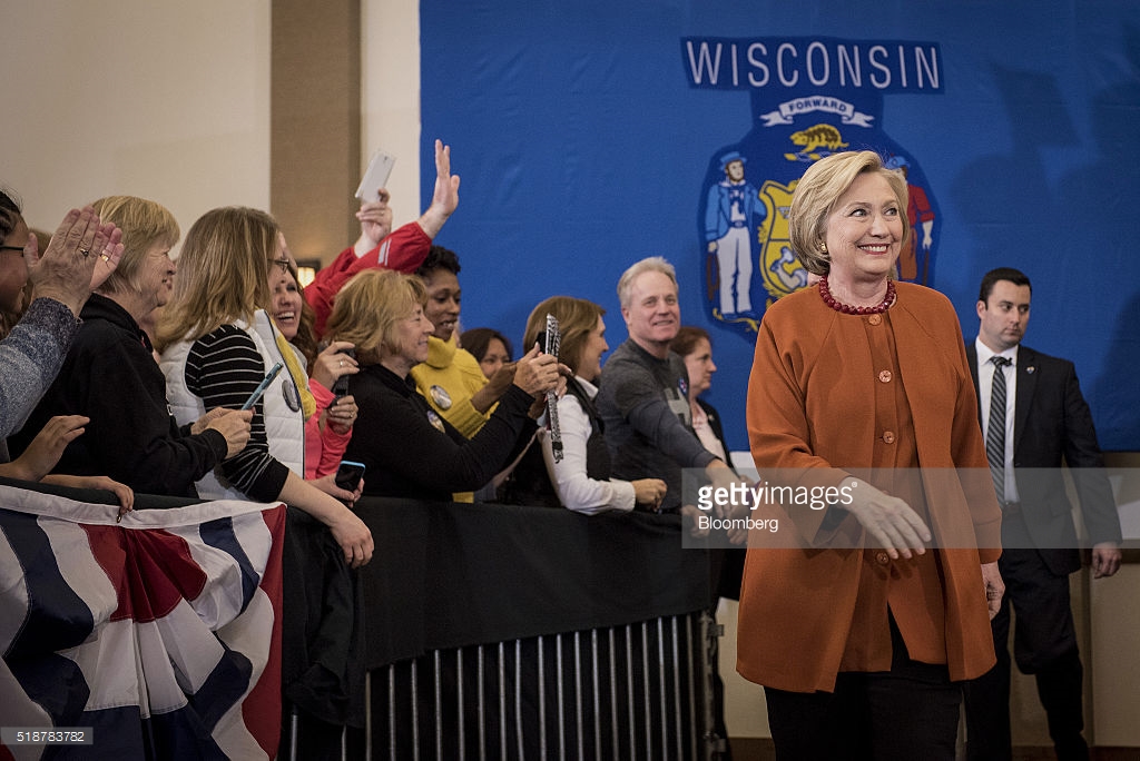 Hillary Clinton, former Secretary of State and 2016 Democratic presidential candidate, walks to the stage during a campaign event in Eau Claire, Wisconsin, U.S., on Saturday, April 2, 2016. Clinton used Donald Trump's remarks about punishing women who have abortions if the procedure were outlawed to level a double-barreled attack on the Republican front-runner as well as her Democratic rival, Bernie Sanders. Photographer: Christopher Dilts/Bloomberg *** Local Caption *** Hillary Clinton