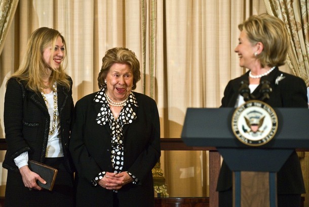 US Secretary of State Hillary Clinton (R) looks back at her mother Dorothy Rodham (C) and daughter Chelsea as she speaks after being ceremonially sworn in at the State Department in Washington on February 2, 2009. AFP PHOTO/Nicholas KAMM (Photo credit should read NICHOLAS KAMM/AFP/Getty Images)