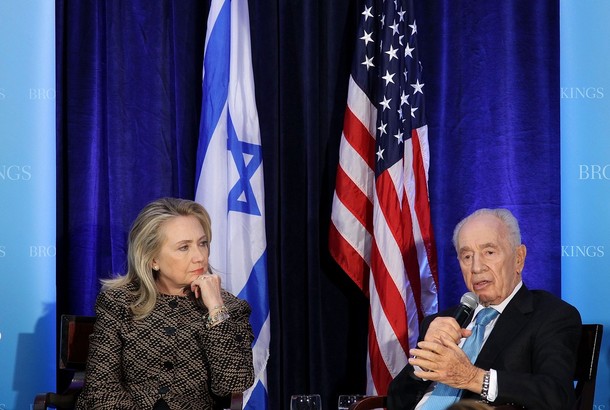 WASHINGTON, DC - JUNE 12: U.S. Secretary of State Hillary Clinton (L) and Israeli President Shimon Peres (R) participate in a discussion at the Hay Adams Hotel June 12, 2012 in Washington, DC. The Clinton-Peres discussion was part of the 10th anniversary celebration of the Saban Center for Middle East Policy of Brookings Institution. (Photo by Alex Wong/Getty Images)