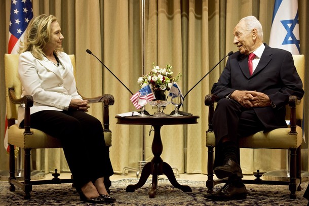 Israel's President Shimon Peres, right, and U.S. Secretary of State Hillary Rodham Clinton, left, meet at the President's residence in Jerusalem, Monday, July 16, 2012. Clinton made perhaps her final visit to Israel as secretary of state on Monday, bringing a message of solidarity to the Jewish state after three-and-a-half years of only stunted progress toward a Palestinian peace deal. (AP Photo/ Brendan Smialowski, Pool)